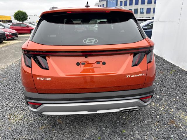 Hyundai / TUCSON / Orange / / / MHEV DCT ACC SHZ 360 MATRIX KRELL 