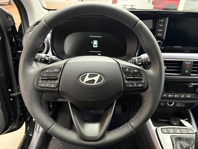 Hyundai i10 PREMIUM AUT SHZ KLIMAAUTOMATIK AMBIENTE ALU RFK PDC NAVI 