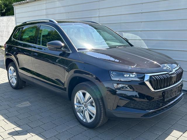 Skoda Karoq - Extra Plus 2.0 TDI DSG AHK*Android Auto*Matrix*E-Heck*SHZ*ACC*Keyless*Kamera*17" LM* 2Z Klimaauto*SUNSET