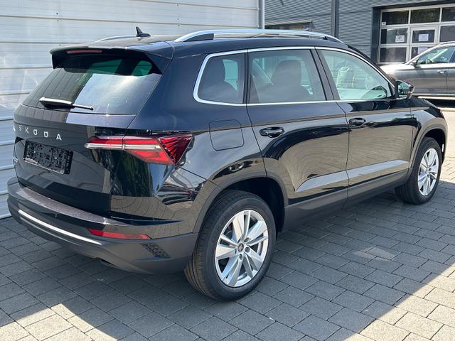 Skoda Karoq Extra Plus 2.0 TDI DSG AHK*Android Auto*Matrix*E-Heck*SHZ*ACC*Keyless*Kamera*17" LM* 2Z Klimaauto*SUNSET 