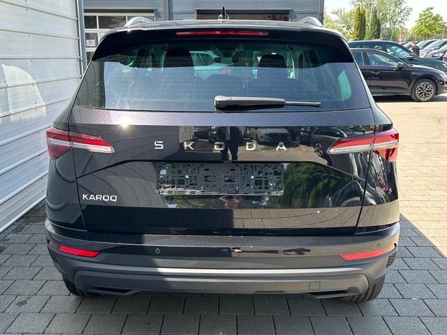 Skoda Karoq Extra Plus 2.0 TDI DSG AHK*Android Auto*Matrix*E-Heck*SHZ*ACC*Keyless*Kamera*17" LM* 2Z Klimaauto*SUNSET 
