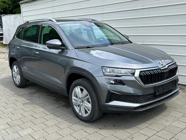 Skoda Karoq - Extra 2.0 TDI DSG AHK*Android Auto*SHZ*ACC*Keyless*Kamera*17" LM* 2Z Klimaauto*SUNSET