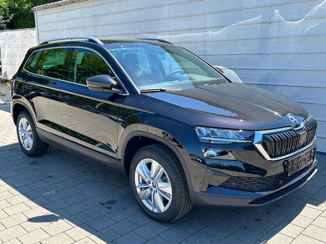 Skoda Karoq - Extra 2.0 TDI DSG AHK*Android Auto*SHZ*ACC*Keyless*Kamera*17" LM* 2Z Klimaauto*SUNSET