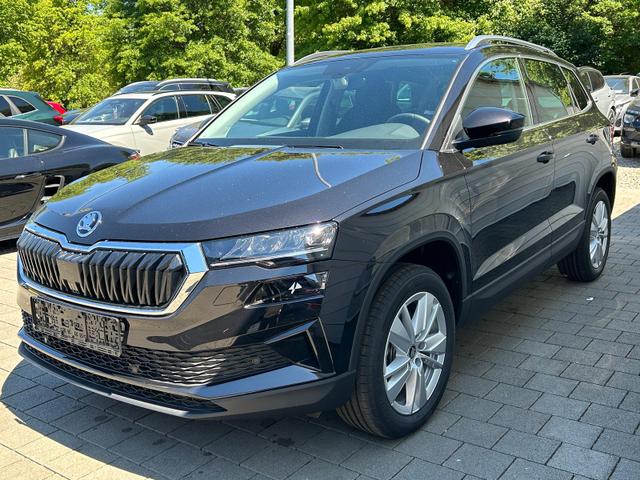 Skoda Karoq Extra 1.5 TSI DSG AHK*Android Auto*SHZ*ACC*Keyless*Kamera*17" LM* 2Z Klimaauto*SUNSET 