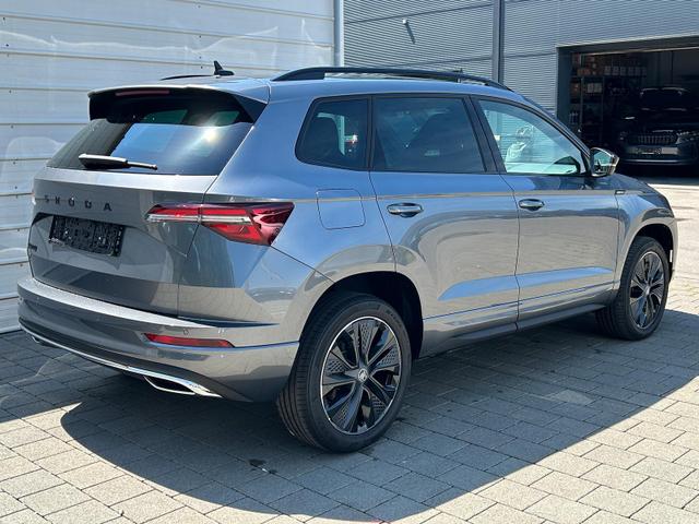 Skoda Karoq Sportline 2.0 TDI DSG AHK*NAVI*Android Auto**SHZ*Keyless*Kamera*ACC 