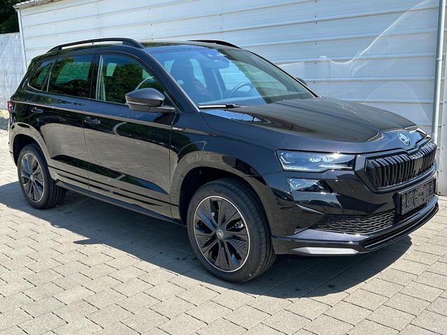 Skoda Karoq - Sportline 2.0 TDI DSG AHK*NAVI*Android Auto**SHZ*Keyless*Kamera*ACC