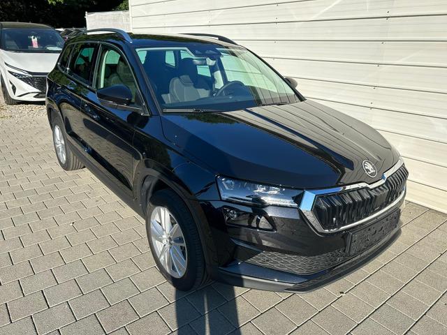 Skoda Karoq Extra Plus 1.5 TSI DSG AHK*Android Auto*Matrix*E-Heck*SHZ*ACC*Keyless*Kamera*17" LM* 2Z Klimaauto*SUNSET 