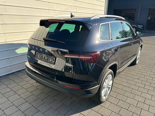 Skoda Karoq Extra Plus 1.5 TSI DSG AHK*Android Auto*Matrix*E-Heck*SHZ*ACC*Keyless*Kamera*17" LM* 2Z Klimaauto*SUNSET 