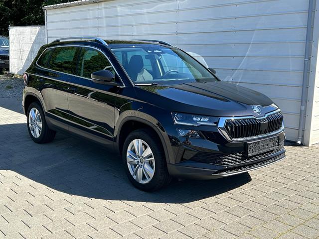 Lagerfahrzeug Skoda Karoq - Extra 2.0 TDI DSG AHK Android Auto SHZ ACC Keyless Kamera 17" LM  2Z Klimaauto SUNSET