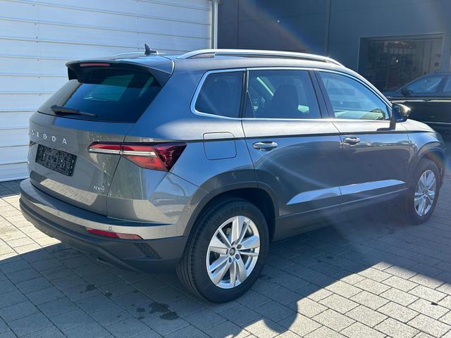 Skoda Karoq Extra Plus 2.0 TDI DSG 4x4 AHK*Android Auto*Matrix*E-Heck*SHZ*ACC*Keyless*Kamera*17" LM* 2Z Klimaauto*SUNSET 