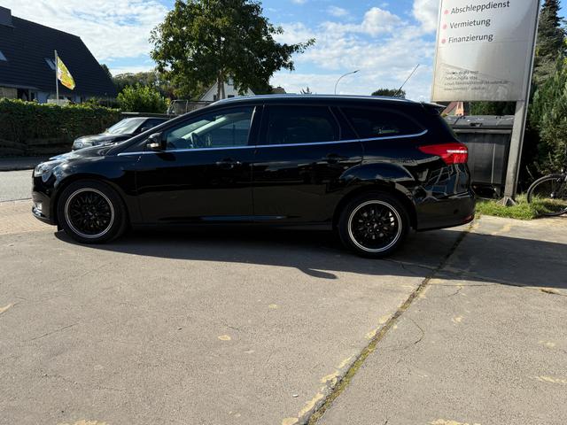 Ford Focus Turnier 2.0 TDCi Autom. "Titanium" Navi-Sitz-/Lenkrad-Frontscheibenhzg.-Park Assistent-GRA-MFA-Klima-ZV/FFB 