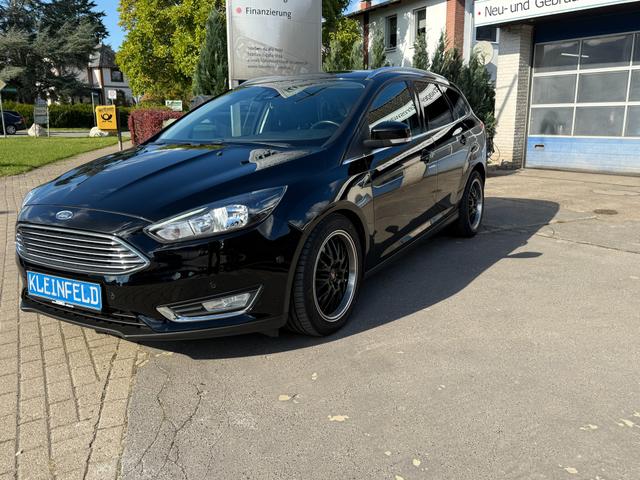 Ford Focus Turnier 2.0 TDCi Autom. "Titanium" Navi-Sitz-/Lenkrad-Frontscheibenhzg.-Park Assistent-GRA-MFA-Klima-ZV/FFB 