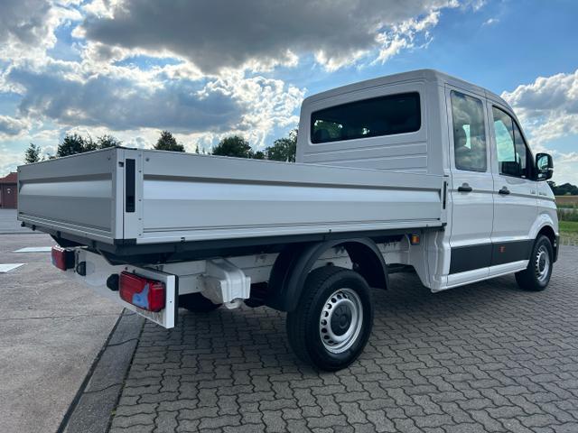 Volkswagen / Crafter Pritsche DoKa / Weiß / / / MAN TGE 3.180 2.0 TDI MR 4x4 DSG / Sperre