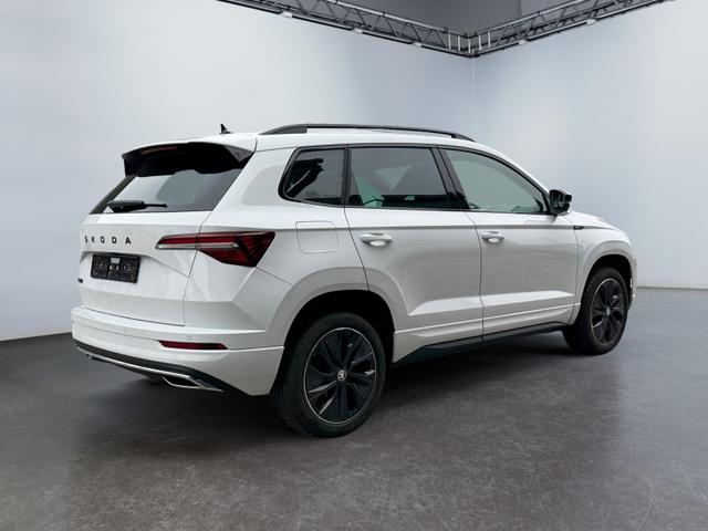 Skoda Karoq 1,5 TSI DSG Sportline 2ZKli AHK ACC SHT PDC Kam 5JG 