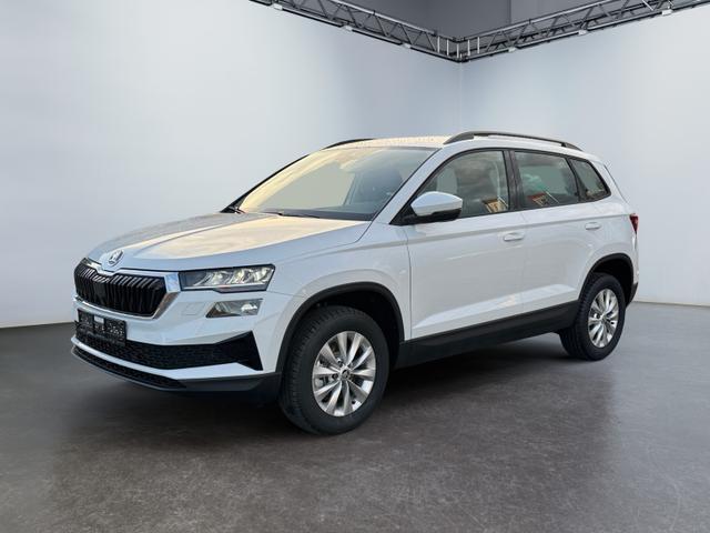 Skoda Karoq - 1.5 TSI DSG Selec 2Zoklim SHZ LED 2xPDC Kam ACC AHK Sunset 5JG