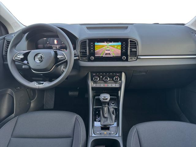 Skoda Karoq 1.5 TSI DSG Selec 2Zoklim SHZ LED 2xPDC Kam ACC AHK Sunset 5JG 