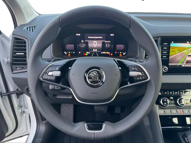 Skoda Karoq 1.5 TSI DSG Selec 2Zoklim SHZ LED 2xPDC Kam ACC AHK Sunset 5JG 