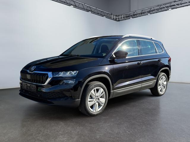 Skoda Karoq - 1.5 TSI DSG Selec 2Zoklim SHZ LED 2xPDC Kam ACC AHK Sunset 5JG