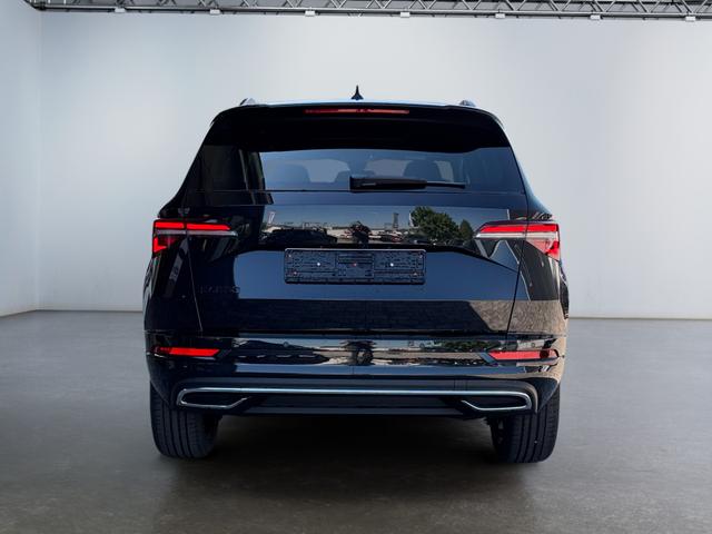Skoda Karoq 1,5 TSI DSG Sportline 2ZKli AHK ACC SHT PDC Kam 5JG 