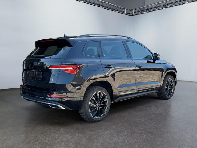 Skoda Karoq 1,5 TSI DSG Sportline 2ZKli AHK ACC SHT PDC Kam 5JG 