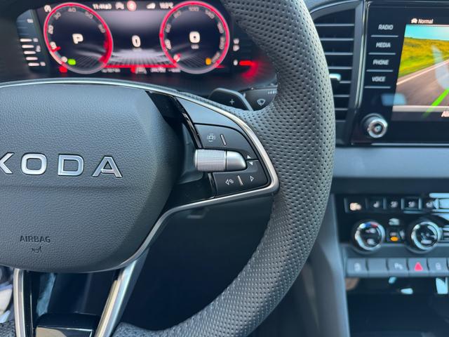 Skoda Karoq 1,5 TSI DSG Sportline 2ZKli AHK ACC SHT PDC Kam 5JG 