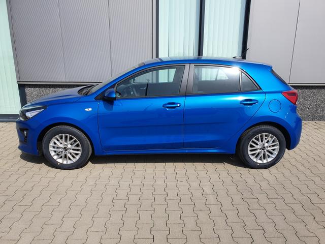 Kia Rio - "Extra" (2) INKL. ZUS&Auml;TZLICH 4 WINTERREIFEN ! 1.2 MPi 84PS Blau-Metallic, 15" Alu auf Sommerbereifung, Lederlenkrad, Parksensoren hinten, R&uuml;ckfahrkamera, Radio 8"AppleCarPlay (Navigation &uuml;ber Smartphone), Klimaanlage, Alarm, Reserverad, Lichtsensor