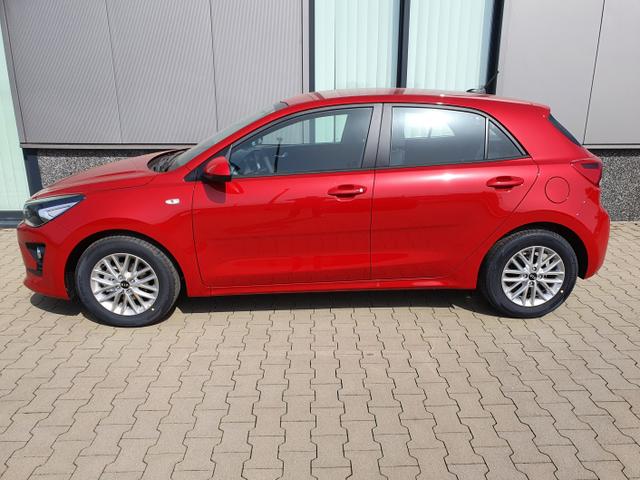 Kia Rio - "Extra" (2) INKL. ZUS&Auml;TZLICH 4 WINTERREIFEN ! 1.2 MPi 84PS Rot-Metallic, 15" Alu auf Sommerbereifung, Lederlenkrad, Parksensoren hinten, R&uuml;ckfahrkamera, Radio 8"AppleCarPlay (Navigation &uuml;ber Smartphone), Klimaanlage, Alarm, Reserverad, Lichtsensor