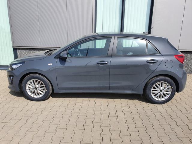 Kia Rio - "Extra" (2) INKL. ZUS&Auml;TZLICH 4 WINTERREIFEN ! 1.2 MPi 84PS Grau-Metallic, 15" Alu auf Sommerbereifung, Lederlenkrad, Parksensoren hinten, R&uuml;ckfahrkamera, Radio 8"AppleCarPlay (Navigation &uuml;ber Smartphone), Klimaanlage, Alarm, Reserverad, Lichtsensor