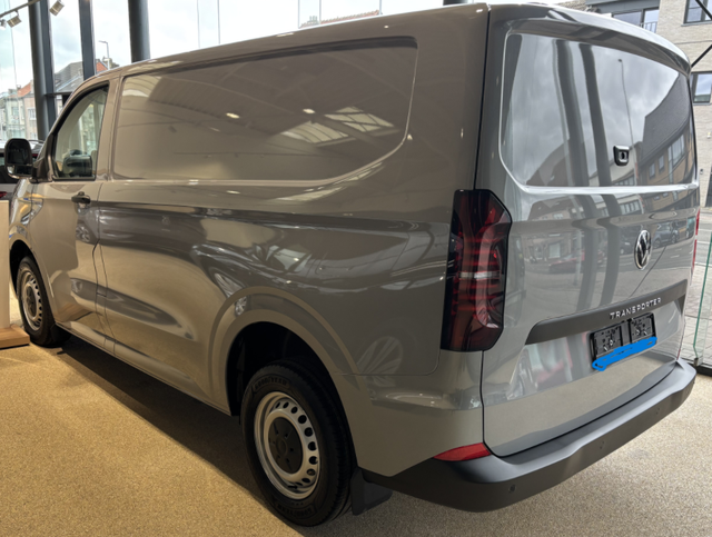 Volkswagen T7 Kastenwagen Transporter LIEFERUNG KOSTENLOS! 2.0 TDI 150PS AUTOMATIK LANGER RADSTAND, Parksensoren hinten, Tempomat, Zentralverriegelung + Keyless Start, Radio 13" Wireless App-Connect, Schiebetüre rechts, Heckklappe 