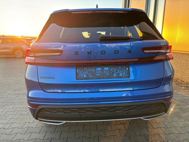 Skoda Kodiaq Sportline 2.0 TSI 204PS DSG 4x4, 3J. Garantie, 19" Alu, Beheizte Frontscheibe, Sportsitze, SunSet, MATRIX-LED, NAVI 13", Alarm, Anhängerkupplung, Elektr. Heckklappe, ACC, 3Z-Climatronic, KESSY, Sitzheizung, Parksensoren v/h, Kamera, Fahrersitz elektr, Sport-M-Led 