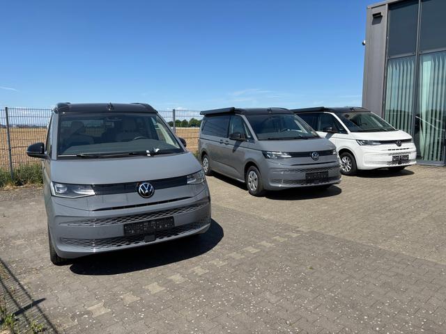 Volkswagen T7 California Ocean 2.0 TDI 150PS DSG, 16" Alu, ELEKTRISCHES Aufstelldach, Privacy-Glas, Climatronic, KÜCHE, Standheizung + FB, Sitzheizung, Park Assist, Parksensoren v/h, Kamera, IQ Light LED-MATRIX, Markise, Side ACC, Ganzjahresreifen, Radio 10" App-Connect 