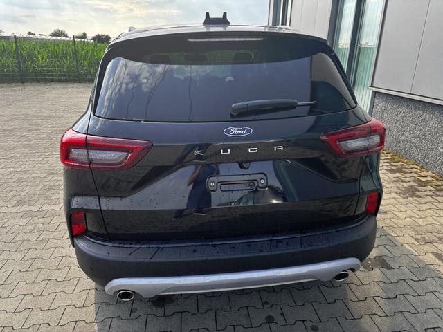 Ford Kuga Titanium 1.5 EcoBoost 186PS AUTOMATIK, Schwarz-Metallic, Winter-Paket, 5 Jahre Garantie, 17" Alu + Allwetterreifen, Navigation 13"-Display, Parksensoren vorne/hinten, Rückfahrkamera, Climatronic, Privacy-Glas, Key-Free-System, Tempomat, LED-Scheinwerfer 