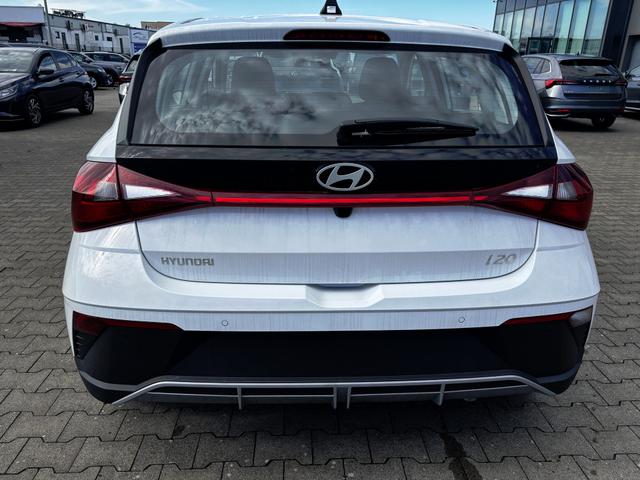 Hyundai i20 Comfort 1.2i 79PS, Sonderfarbe ATLAS-WHITE, DESIGN-PACK: 16" ALUFELGEN + LED, 5 Jahre Garantie, NAVIGATION 10,25", Klima, Parksensoren hinten, Rückfahrkamera, Alarm, Lederlenkrad, Tempomat, Armlehne vorne, Reserverad, 4x elektr. Fensterheber, Fernlicht-Assistent 