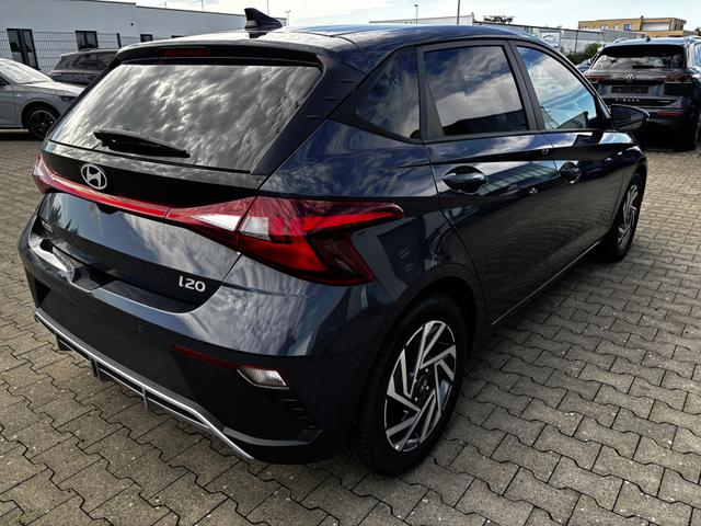 Hyundai i20 Family 1.2i 79PS, AURORA-GRAU METALLIC, WINTER-PAKET, KLIMAAUTOMATIK, 16" ALUFELGEN, 5 Jahre Garantie, NAVIGATION 10,25", Parksensoren hinten, Rückfahrkamera, Alarm, Lederlenkrad, Tempomat, Armlehne vorne, Reserverad, 4x elektr. Fensterheber, Fernlicht-Assisten 