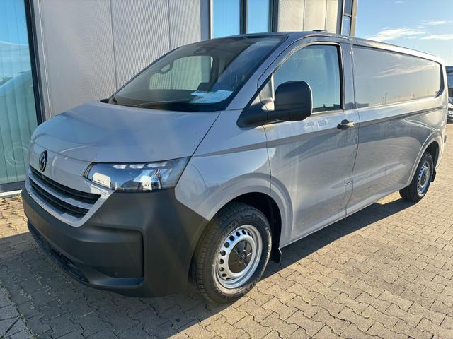 Volkswagen T7 Kastenwagen - Basis 2.0 TDI 170PS AUTOMATIK LANG, Grau, HECKFLÜGELTÜREN, 2-Zonen-Klimautomatik, M-Lederlenkrad, Anhängerkupplung, Parksensoren vorn/hinten, Rückfahrkamera, Frontscheibe beheizbar, Ganzjahresreifen, Sitzpaket 46 (inkl. Sitzheizung), Reserverad, 70l Tank