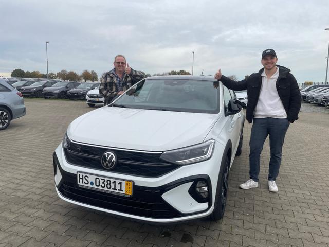 Fahrzeugübergabe eines Volkswagen Taigo 