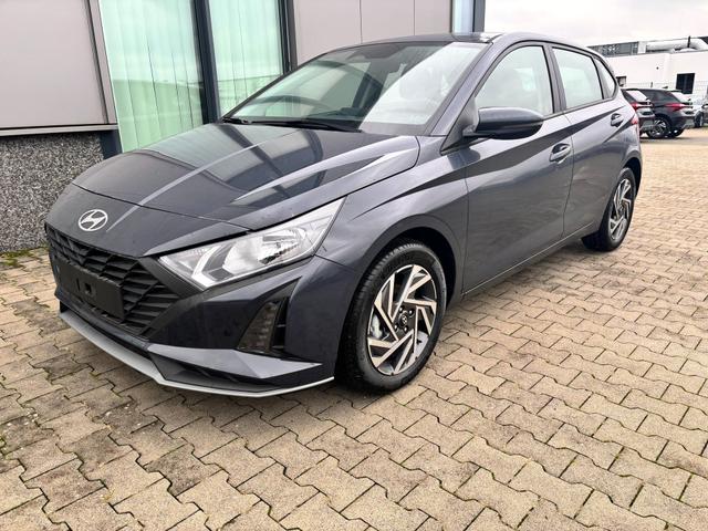 Hyundai i20 - Comfort 1.2i 79PS, AURORA-GRAU METALLIC, 16" ALUFELGEN, 5 Jahre Garantie, NAVIGATION 10,25", Klima, Parksensoren hinten, Rückfahrkamera, Alarm, Lederlenkrad, Tempomat, Armlehne vorne, Reserverad, 4x elektr. Fensterheber, Fernlicht-Assistent
