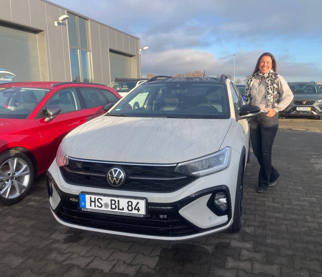 Fahrzeugübergabe eines VW Taigo 