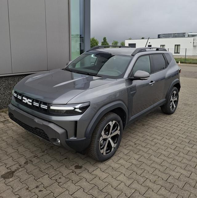 Dacia Duster - Journey hybrid-G 150 (Benzin+LPG) 4x4 (ALLRAD) AUTOMATIK, GRAU-MET+WINTER-PAKET (Vordersitze/Lenkrad/Frontscheibe beheizt) + PARKING-PAKET (Toter-Winkel-Assistent, 360&deg;-Kamera, Parksensoren vorn), hinten, Klimaautomatik, Tempomat, NAVI, 18" ALU