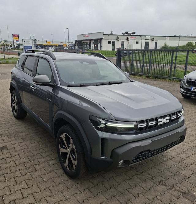Dacia Duster Journey hybrid-G 150 (Benzin+LPG) 4x4 (ALLRAD) AUTOMATIK, GRAU-MET+WINTER-PAKET (Vordersitze/Lenkrad/Frontscheibe beheizt) + PARKING-PAKET (Toter-Winkel-Assistent, 360&deg;-Kamera, Parksensoren vorn), hinten, Klimaautomatik, Tempomat, NAVI, 18" ALU 