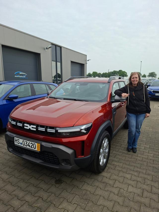 Fahrzeugübergabe eines Dacia Duster 