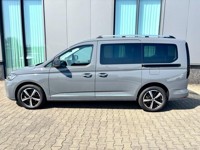 Volkswagen Caddy Maxi Style BEHINDERTENUMBAU (HECKAUSSCHNITT) 1.5 TSI 115PS DSG/AUTOMATIK, PURE-GREY, 17" Alu/Ganzjahresreifen, Winterpaket, ACC-Tempomat, Toter-Winkel, ParkAssist, Parksensoren vo/hi, R&uuml;ckfahrkamera, Radio Ready2Discover 10" + Wireless AppConnect, Climatronic 