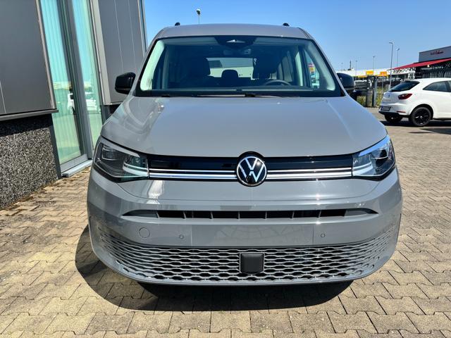 Volkswagen Caddy Maxi Style BEHINDERTENUMBAU (HECKAUSSCHNITT) 1.5 TSI 115PS DSG/AUTOMATIK, PURE-GREY, 17" Alu/Ganzjahresreifen, Winterpaket, ACC-Tempomat, Toter-Winkel, ParkAssist, Parksensoren vo/hi, R&uuml;ckfahrkamera, Radio Ready2Discover 10" + Wireless AppConnect, Climatronic 