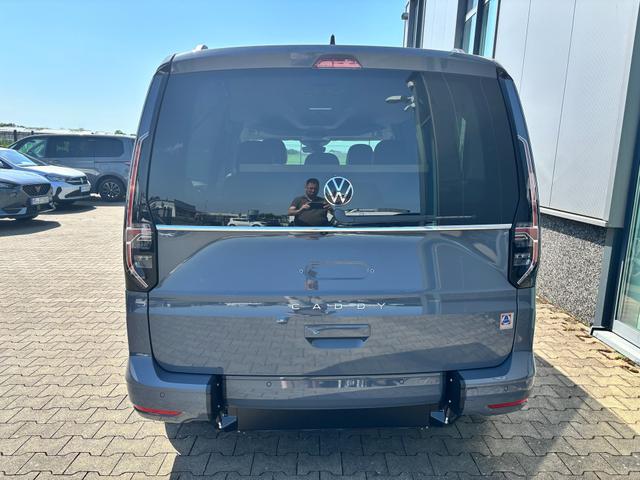 Volkswagen Caddy Maxi Style BEHINDERTENUMBAU (HECKAUSSCHNITT) 1.5 TSI 115PS DSG/AUTOMATIK, PURE-GREY, 17" Alu/Ganzjahresreifen, Winterpaket, ACC-Tempomat, Toter-Winkel, ParkAssist, Parksensoren vo/hi, R&uuml;ckfahrkamera, Radio Ready2Discover 10" + Wireless AppConnect, Climatronic 