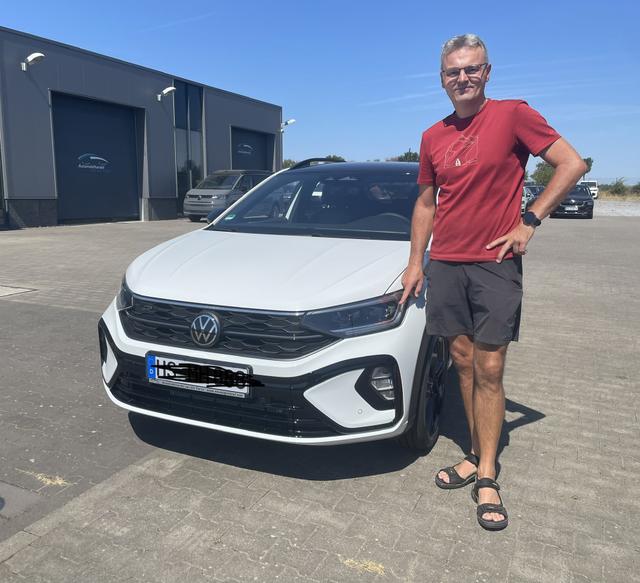 Fahrzeugübergabe eines Volkswagen Taigo 