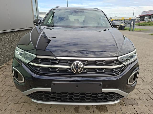 Volkswagen T-Roc Style Modell 2025, 1.5 TSI 150PS DSG, Schwarz-Met, Elektr. Heckklappe, ACC, Virtual Cockpit, Climatronic, ParkAssist, Parksensoren v/h, R&uuml;ckfahrkamera, Sitzheizung, Privacy-Glas, M-Lederlenkrad beheizt, 19" ALU "Misano" schwarz, IQ LIGHT MATRIX, Keyless 
