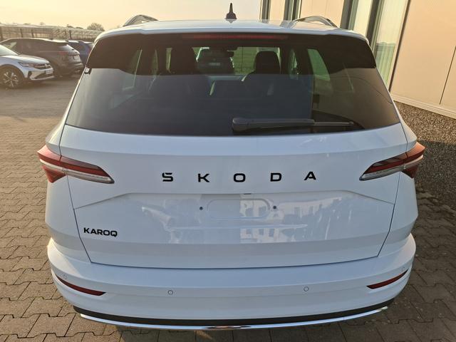 Skoda Karoq Sportline 1.5 TSI 150PS DSG, WEISS-MET, 5JGARANTIE, AHK SCHWENKBAR, 19" ALU SAGITARIUS, BEHEIZTE FRONTSCHEIBE, SITZHEIZUNG, MATRIX-LED, Elektr. Heckklappe, Virtual Cockpit 10", Climatronic, NAVI, ACC, Parksensoren v/h, R&uuml;ckfahrkamera, Dachreling, PRIVACY-GLAS 