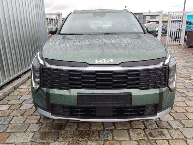 Kia / Sportage / Grün / / / , Bild dient zur Illustration und zeigt aufpreispflichtige Sonderausstattung. "Die Herstellergarantie beginnt bei EU-Fahrzeugen bereits bei Auslieferung vom ausländischen Lieferanten und kann um mehr als 14 Tage verkürzt sein.