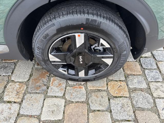 Kia / Sportage / Gr&uuml;n / / / , Bild dient zur Illustration und zeigt aufpreispflichtige Sonderausstattung. "Die Herstellergarantie beginnt bei EU-Fahrzeugen bereits bei Auslieferung vom ausl&auml;ndischen Lieferanten und kann um mehr als 14 Tage verk&uuml;rzt sein.