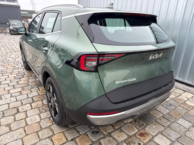 Kia / Sportage / Gr&uuml;n / / / , Bild dient zur Illustration und zeigt aufpreispflichtige Sonderausstattung. "Die Herstellergarantie beginnt bei EU-Fahrzeugen bereits bei Auslieferung vom ausl&auml;ndischen Lieferanten und kann um mehr als 14 Tage verk&uuml;rzt sein.